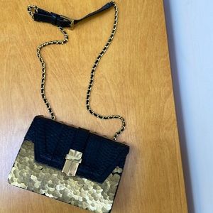 Angle Jackson sequins studs snack skin crossbody bag